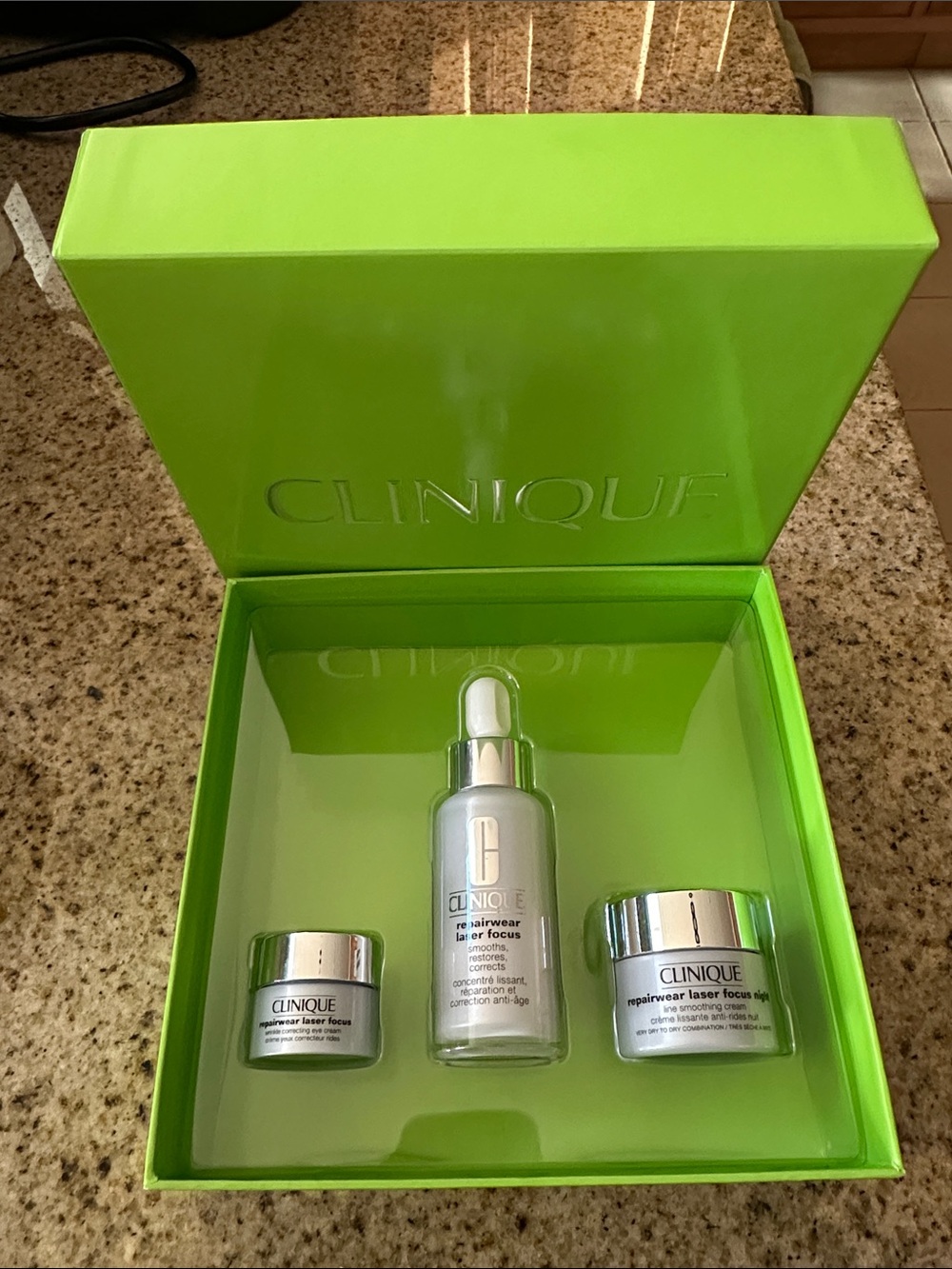 Clinique skincare trio in bright lime green and silver. Brand New!